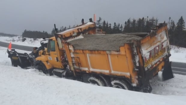 TCH plow stuck in snow median highway Newfoundland spring blizzard
