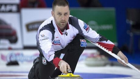 Team Canada skip Brad Gushue makes a shot during a draw against Russia at the Men's World Curling Championships in Edmonton, Sunday, April 2, 2017. THE CANADIAN PRESS/Jonathan Hayward gushue-brad-170402-1180