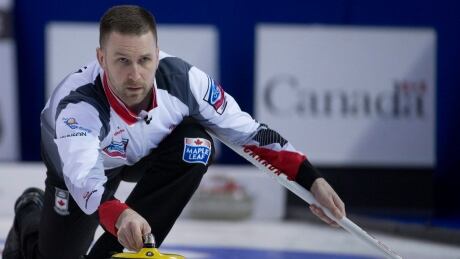Canada skip Brad Gushue makes a shot during the seventh draw against Scotland. gushue-brad
