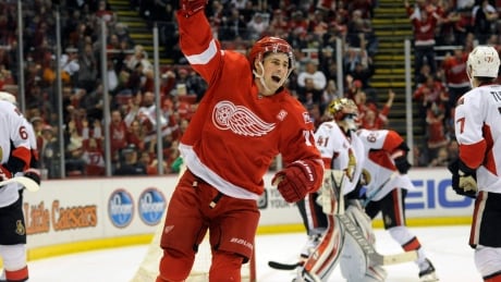 Detroit Red Wings center Dylan Larkin celebrates a short-handed goal against the Ottawa Senators in Monday's 5-4 shootout win. red-wings