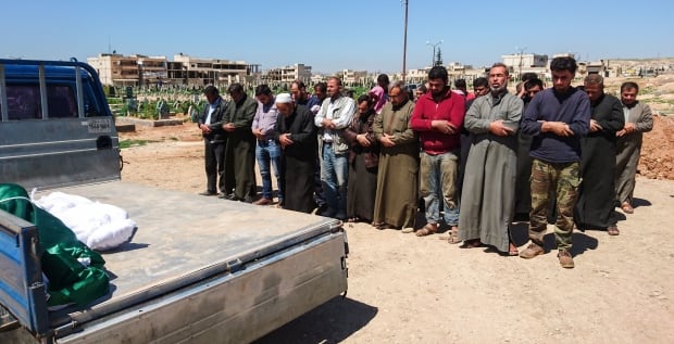 Syria funeral for victims of suspected toxic gas attack