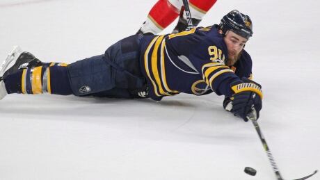 Buffalo Sabres forward Ryan O'Reilly dives for the puck during the third period against the Florida Panthers on March 27 in Buffalo, N.Y. oreilly-ryan-032717-620