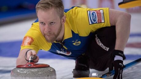 Sweden skip Niklas Edin makes a shot during the 10th draw against Russia at the Men's World Curling Championships in Edmonton, Tuesday, April 4, 2017. THE CANADIAN PRESS/Jonathan Hayward edin-niklas-170404-1180