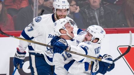 Nikita Kucherov, right, had a goal and an assist to keep Tampa Bay's playoff hopes alive. nikita-kucherov