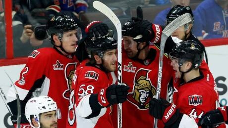 Ottawa's Mike Hoffman, second from right, celebrates with his teammates after scoring against the Rangers on Saturday. HKN Rangers Senators 20170408