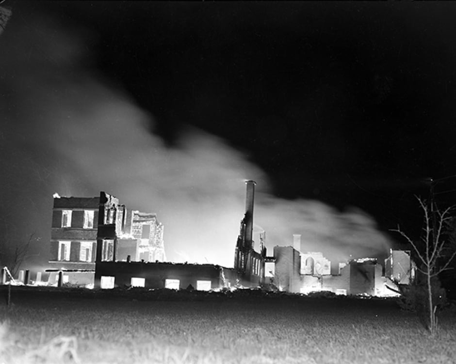 Villa St. Louis Convent on fire after CF-100 military jet crash in Orlean May 15,1956