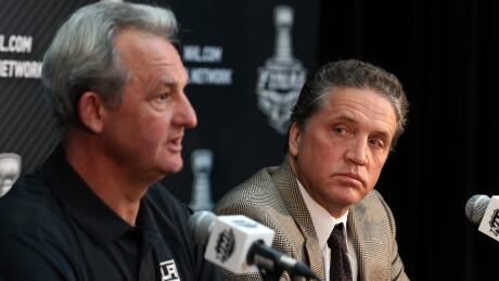 Coach Darryl Sutter, left, and president/GM Dean Lombardi were fired Monday by the Los Angeles Kings. 495659845JH00138_2014_NHL_S