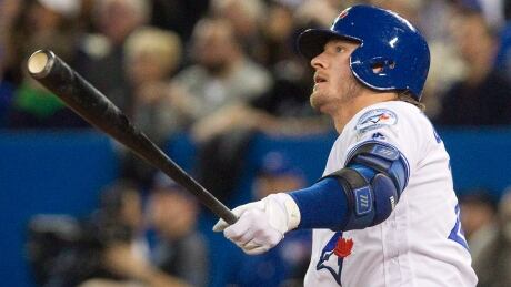 The Blue Jays' Josh Donaldson, watching his fourth-inning grand slam in their 2016 home opener against Boston, is not in Toronto's lineup for Tuesday night's home opener against Milwaukee because of a sore right calf. donaldson-josh-160408-1180