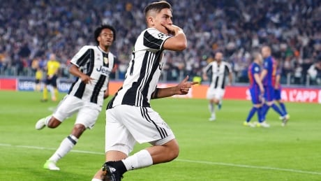 Paulo Dybala celebrates after scoring against Barcelona during the first leg of their Champions League quarter-final on Tuesday Paulo-Dybala-Champions-League