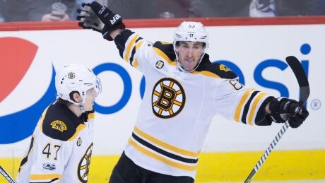 Boston's Brad Marchand celebrates his winning goal in the Bruins' 2-1 victory over Ottawa in Game 1 of their playoff series Wednesday. Brad Marchand GWG Gm 1