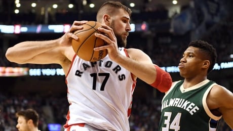 Raptors centre Jonas Valanciunas, left, will need another strong postseason to contain the dynamic Giannis Antetokounmpo. BKN Bucks Raptors 20161212