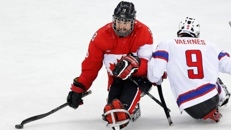 Billy Bridges, left, and Liam Hickey paced Canada with two goals and four points each in Thursday's 7-0 throttling of Italy at the world para-hockey championship in South Korea. bridges-billy-140315-1180
