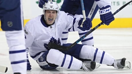 Toronto rookie Mitch Marner celebrates his game-opening goal against Washington Thursday. The Capitals went on to win 3-2 in overtime. 95331936