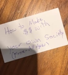 Back of business card handed to kids selling lemonade
