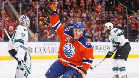 San Jose Sharks' Martin Jones (31) and Brent Burns (88) react as Edmonton Oilers' Zack Kassian celebrates his goal during the second period in Edmonton on Friday. kassian-zack-041417-620