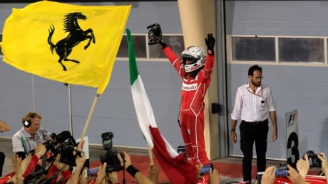 Ferrari driver Sebastian Vettel of Germany celebrates after winning the Bahrain Formula One Grand Prix in Sakhir, Bahrain, on Sunday. APTOPIX Bahrain F1 GP Auto Racing