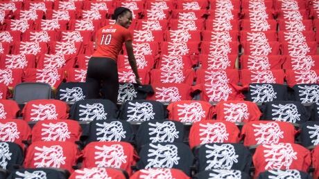 T-shirts were laid out on seats of the Air Canada Centre during preparations for the Toronto Raptors' opening game against the Milwaukee Bucks last Saturday. Raptors-Marketing-Team