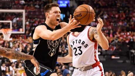Milwaukee Bucks guard Matthew Dellavedova (8) in action on Saturday against the Toronto Raptors. Milwaukee holds a 1-0 series lead. dellavedova-matthew