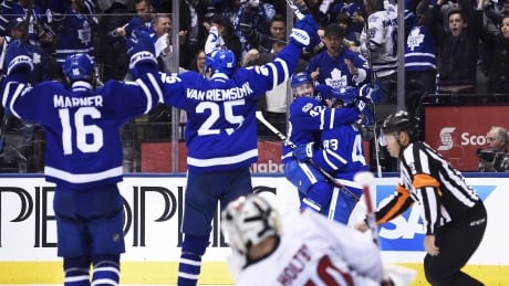 Toronto Maple Leafs centre Tyler Bozak (42) celebrates his overtime goal against Washington Capitals goalie Braden Holtby during Monday's 4-3 victory. caps-leafs