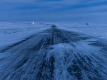 The new permanent road from Inuvik to Tuktoyaktuk snakes through largely unexplored land at the top of the Northwest Territories and ends at the Arctic Ocean, making it possible for the first time ever to drive from coast to coast to coast year round in Canada. 