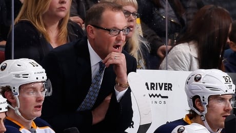 The agents for Sabres star forward Jack Eichel, left, say their client is not the one pushing the NHL team to fire head coach Dan Bylsma, middle. eichel-jack-160118-1180