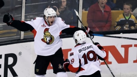 Ottawa Senators right wing Bobby Ryan, left, is congratulated by Derick Brassard after his goal during the third period of Game 4 against Boston. senators-bruins