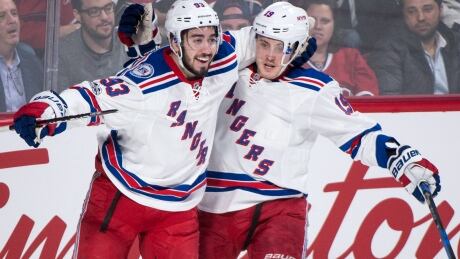 New York Mika Zibanejad, left, scored the game-winner in overtime on Thursday night. HKN Rangers Canadiens 20170420