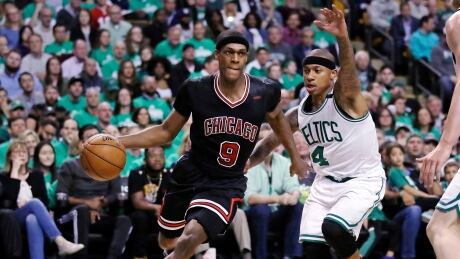 Chicago Bulls guard Rajon Rondo, left, broke his right thumb after swiping for the ball in the third quarter of Game 2. rajon-rondo