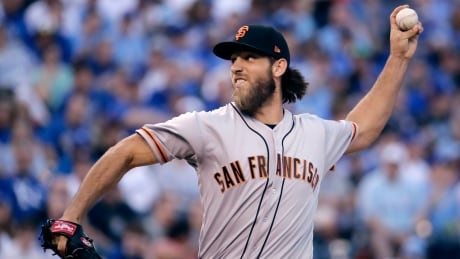 San Francisco Giants ace Madison Bumgarner bruised his ribs and sprained a joint in his pitching shoulder after a dirk bike accident. bumgarner-madison-04192017