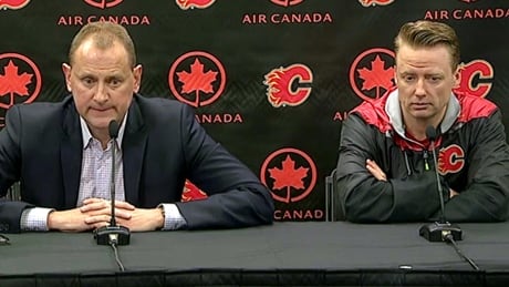 Calgary Flames GM Brad Treliving, left, and head coach Glen Gulutzan speak to reporters on Friday. Brad Treliving Glen Gulutzan Flames