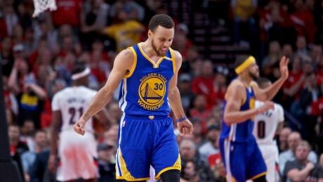 Stephen Curry of the Golden State Warriors reacts after scoring against the Portland Trail Blazers during Game 3 on Saturday, in Portland, Ore. Warriors-TrailBlazers-22042017