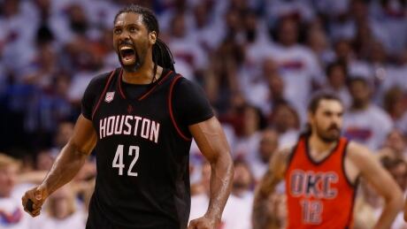 Houston Rockets centre Nene (42) celebrates a basket in front of Oklahoma City Thunder centre Steven Adams (12) in the fourth quarter. rockets-thunder