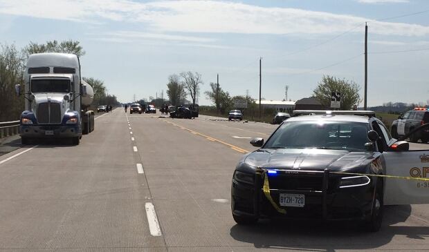 Highway collision: vehicle runs into line-painting safety truck on Highway 402