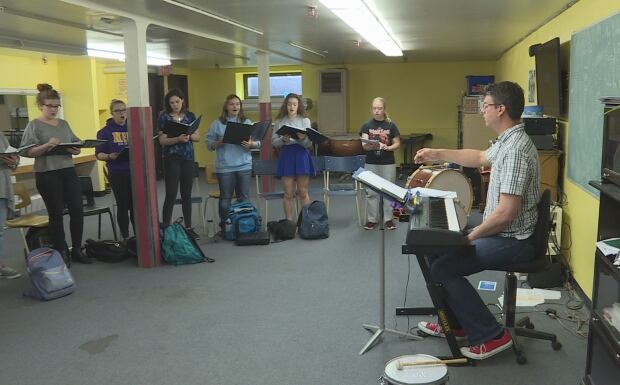 Choir and teacher