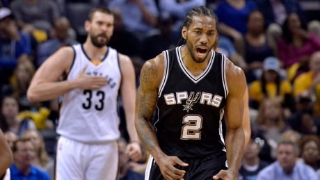 San Antonio Spurs forward Kawhi Leonard, right, and Memphis Grizzlies centre Marc Gasol seen during Game 6 on Thursday in Memphis, Tenn. Leonard scored 29 points to help the Spurs advance to a semifinal series with the Houston Rockets. Spurs Grizzlies Basketball