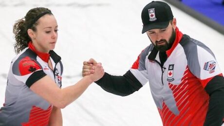 Joanne Courtney, left, shot 87 per cent while Reid Carruthers, right, finished at 95 per cent in Canada's 8-3 playoff win over Scotland Friday. Curling-Mixed