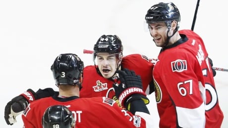 Ottawa Senators centre Jean-Gabriel Pageau (44) celebrates his goal against the New York Rangers with Marc Methot (3), Ben Harpur (67) and Ryan Dzingel (18). rangers-senators