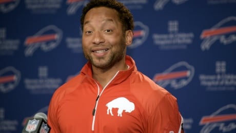 In this Monday, March 2015 file photo, Buffalo Bills general manager Doug Whaley reacts to a question about the future of the team during a news conference at the Ralph Wilson Media Center in Orchard Park, N.Y. Bills Whaley Football