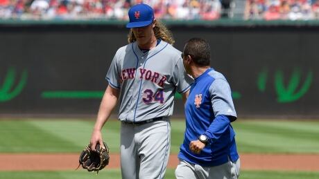 New York Mets starting pitcher Noah Syndergaard (34) leaves a baseball game with an injury during the second inning against the Washington Nationals, on Sunday. Mets Nationals Baseball