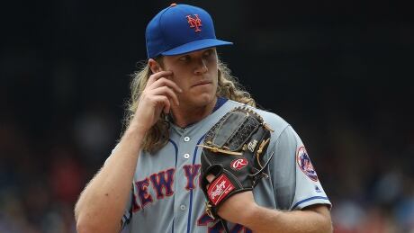 Mets ace pitcher Noah Syndergaard was placed on the 10-day disabled list Monday after being diagnosed with a partial tear of his right lat muscle. The one-time Blue Jays prospect grimaced after throwing a second-inning strike on Sunday and reached for his right armpit. syndergaard-noah-170430-1180
