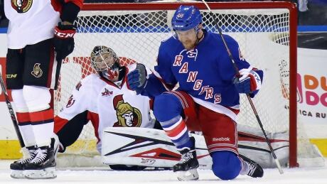 New York's Michael Grabner celebrates his first-period goal against Ottawa's Craig Anderson during the Rangers' 4-1 win Tuesday in Game 3. 95608947