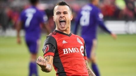 Toronto FC forward Sebastian Giovinco (10) celebrates his goal against Orlando City SC during Toronto's 2-1 win Wednesday. orlando-toronto