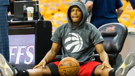 Kyle Lowry, shown before Wednesday's Game 2, missed practice Thursday and is questionable for Game 3 after injuring his ankle in the loss to Cleveland. 95624078