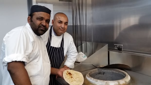 Le Raj cooks Alfen Valles and Mohammed Saleem