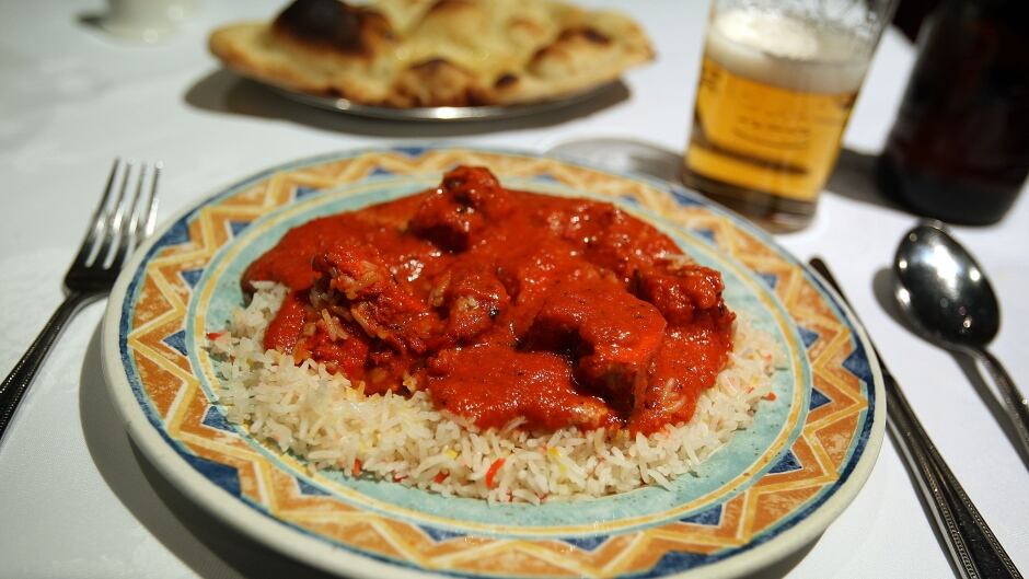 A plate of Chicken Tikka Masala is displayed in a curry restaurant in Brick Lane on February 13, 2008 in London.