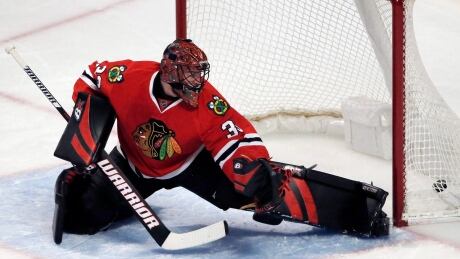 Scott Darling, who was traded by the Chicago Blackhawks to the Carolina Hurricanes last month, signed a four-year contract with Carolina on Friday. darling-scott
