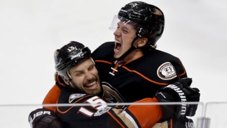 Anaheim Ducks centre Rickard Rakell, right, celebrates after scoring with Ryan Getzlaf in Friday's 4-3 overtime win. APTOPIX Oilers Ducks Hockey
