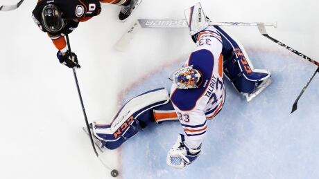 Anaheim Ducks forward Corey Perry, left, scores the game winning goal past Edmonton Oilers goalie Cam Talbot in the second overtime period in Game 5 on Friday in Anaheim, Calif. talbot-cam-050517-629