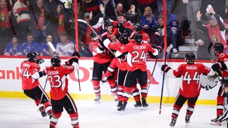 The Ottawa Senators are seen celebrating Kyle Turris' game winning goal against the New York Rangers during the first overtime period in Game 5 in Ottawa on Saturday. The Senators lead the series 3-2. ottawa-senators-050617-620