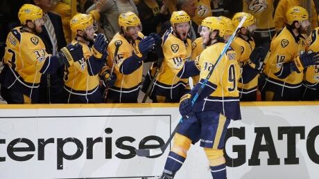 Nashville Predators centre Ryan Johansen (92) celebrates after scoring against the St. Louis Blues during the third period in Game 6 on Sunday in Nashville, Tenn. The Predators advanced to the Western Conference with a 3-1 win. nashville-predators-050717-620